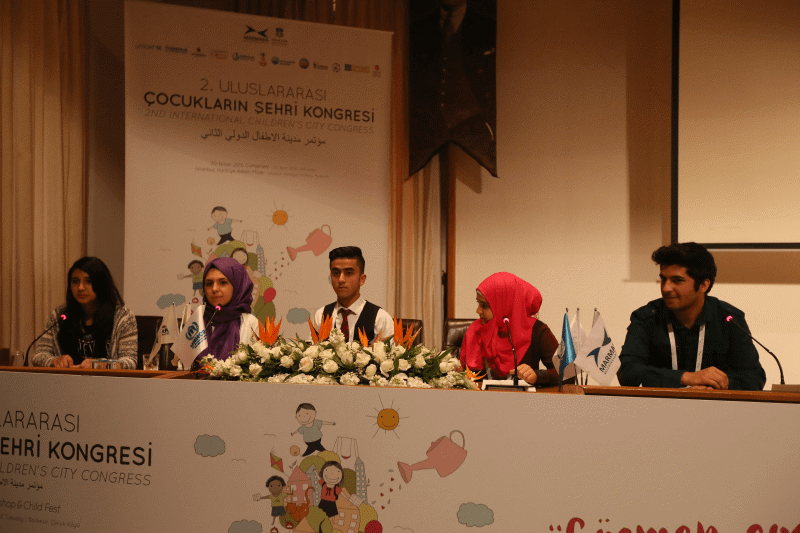 “Göçmen Çocuk İçin Bir Şehir”}